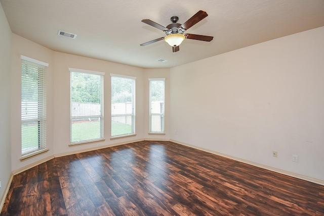 2614 Palm Harbour Dr, Missouri City, TX 77459 - unfurnished room with wood finished floors, a ceiling fan, and baseboards