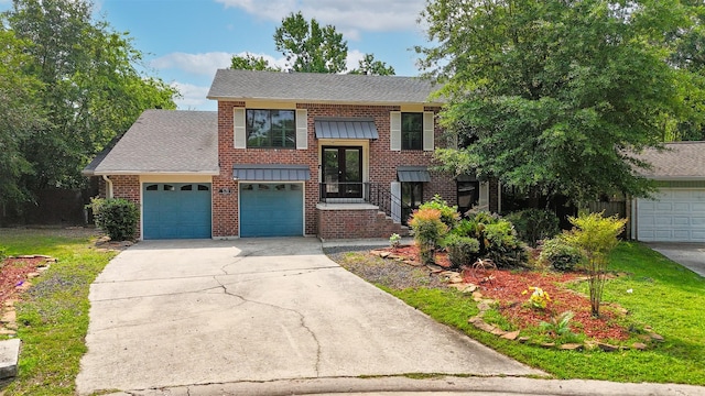 13 Whistlers Ct, The Woodlands, TX 77380 - split foyer home featuring driveway, brick siding, a front lawn, roof with shingles, and a garage