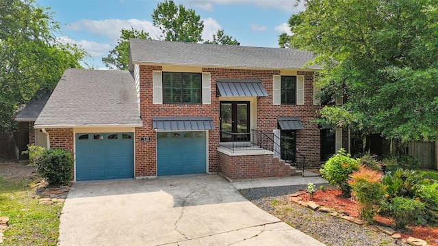13 Whistlers Ct, The Woodlands, TX 77380 - bi-level home with concrete driveway, roof with shingles, and brick siding
