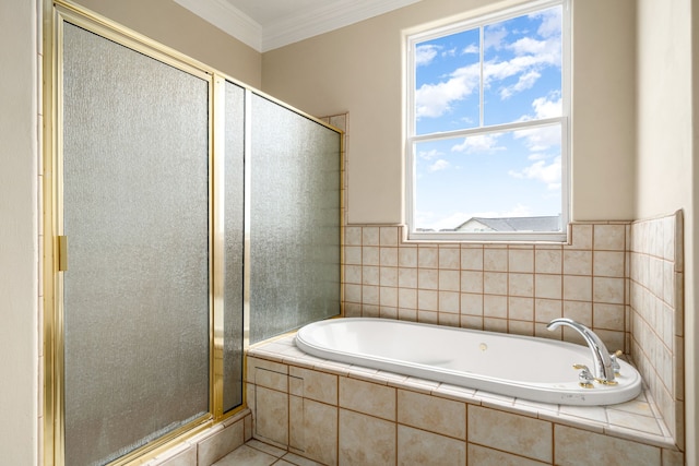 1854 Tiki Dr, Tiki Island, TX 77554 - bathroom with a stall shower, a bath, ornamental molding, and tile patterned floors