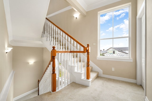 1854 Tiki Dr, Tiki Island, TX 77554 - stairway with healthy amount of natural light, carpet, ornamental molding, and baseboards
