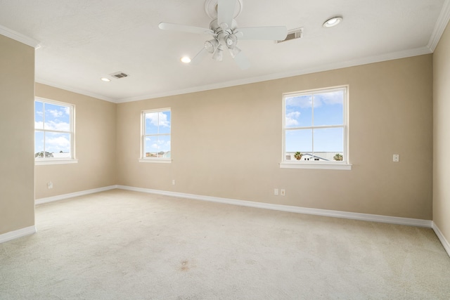 1854 Tiki Dr, Tiki Island, TX 77554 - spare room featuring light carpet, crown molding, baseboards, ceiling fan, and recessed lighting