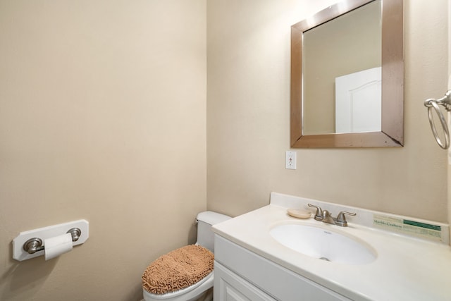 1854 Tiki Dr, Tiki Island, TX 77554 - bathroom featuring toilet and vanity