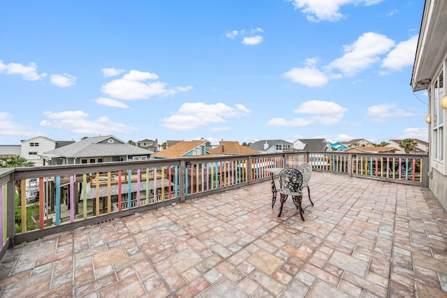 1854 Tiki Dr, Tiki Island, TX 77554 - view of patio with a residential view