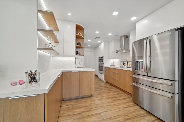 5110 San Felipe St Unit 97W, Houston, TX 77056 - kitchen with stainless steel fridge, open shelves, wall chimney exhaust hood, modern cabinets, and recessed lighting