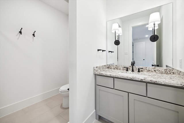 1115 Potomac Dr Unit B, Houston, TX 77057 - bathroom with baseboards, toilet, and vanity