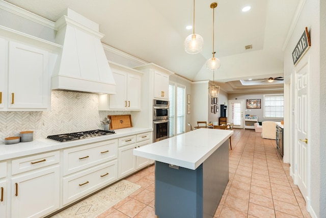 106 Paint Brush St, Lake Jackson, TX 77566 - kitchen with stainless steel appliances, tasteful backsplash, custom range hood, ornamental molding, and light tile patterned floors