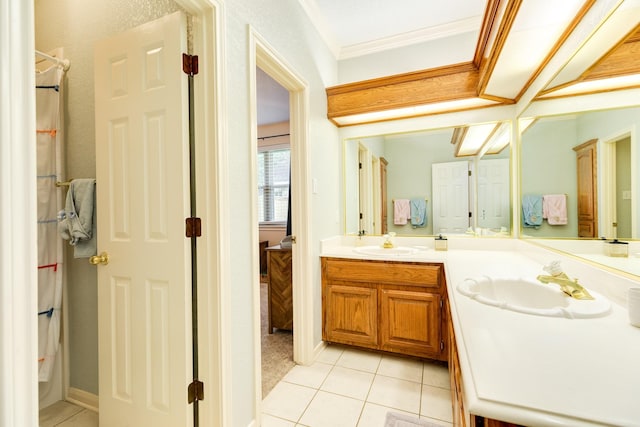 106 Paint Brush St, Lake Jackson, TX 77566 - bathroom featuring double vanity, tile patterned flooring, and crown molding