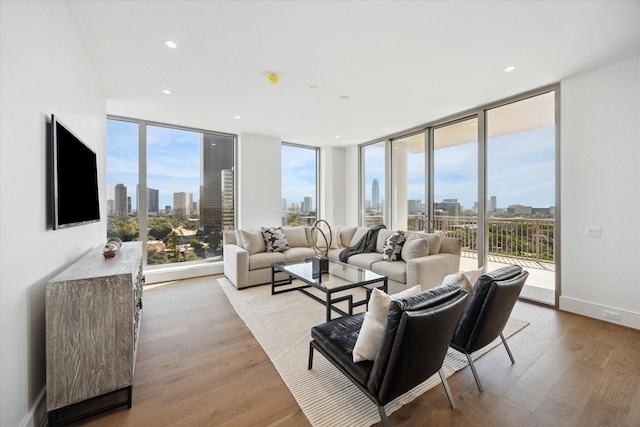 5656 San Felipe St Unit 1301, Houston, TX 77056 - living area featuring healthy amount of natural light and light wood-style flooring