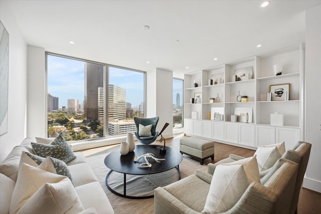 5656 San Felipe St Unit 1301, Houston, TX 77056 - living room with light wood-type flooring, recessed lighting, and a skyline view