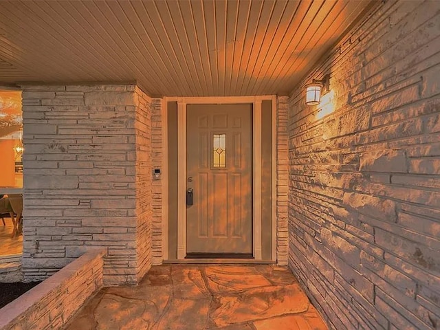 4003 Mischire Dr, Houston, TX 77025 - doorway to property featuring brick siding