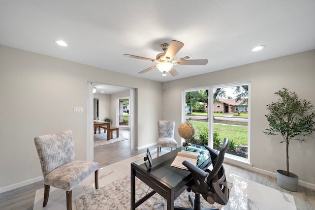 4003 Mischire Dr, Houston, TX 77025 - living area featuring plenty of natural light, ceiling fan, baseboards, light wood-type flooring, and recessed lighting
