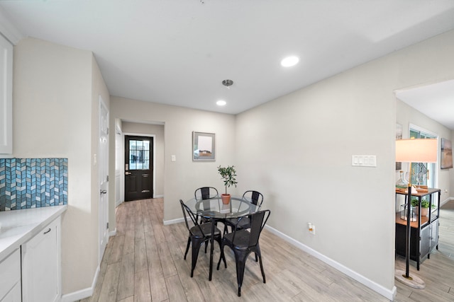 4003 Mischire Dr, Houston, TX 77025 - dining space with light wood-style floors, healthy amount of natural light, baseboards, and recessed lighting