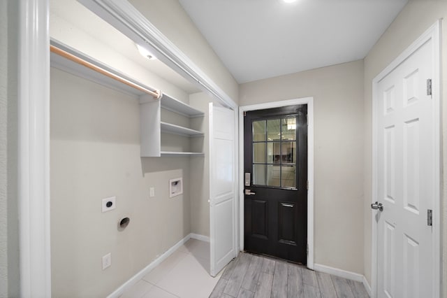 4003 Mischire Dr, Houston, TX 77025 - laundry area with hookup for an electric dryer, baseboards, washer hookup, and light wood finished floors
