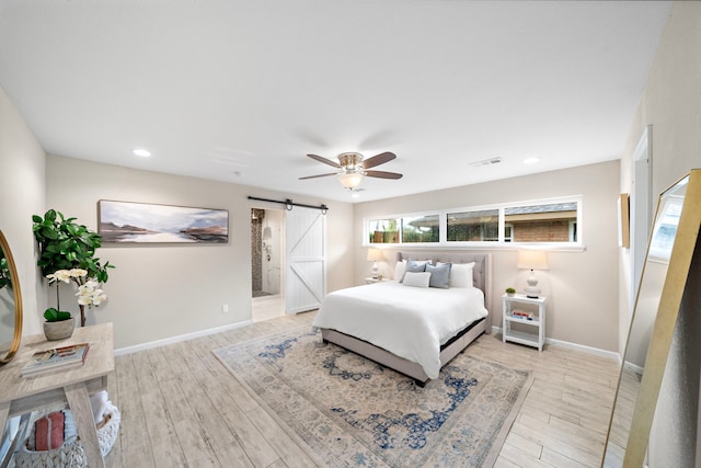 4003 Mischire Dr, Houston, TX 77025 - bedroom featuring a barn door, baseboards, light wood finished floors, recessed lighting, and ceiling fan
