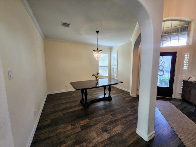 12608 Floral Park Ln, Pearland, TX 77584 - entryway featuring arched walkways, crown molding, dark wood finished floors, and baseboards
