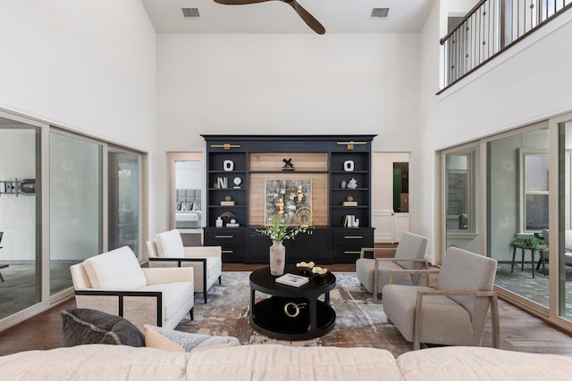 74 N Curly Willow Cir, Tomball, TX 77375 - living area with a high ceiling, wood finished floors, and a ceiling fan