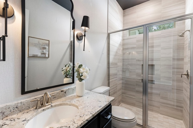 74 N Curly Willow Cir, Tomball, TX 77375 - bathroom with toilet, vanity, and a stall shower