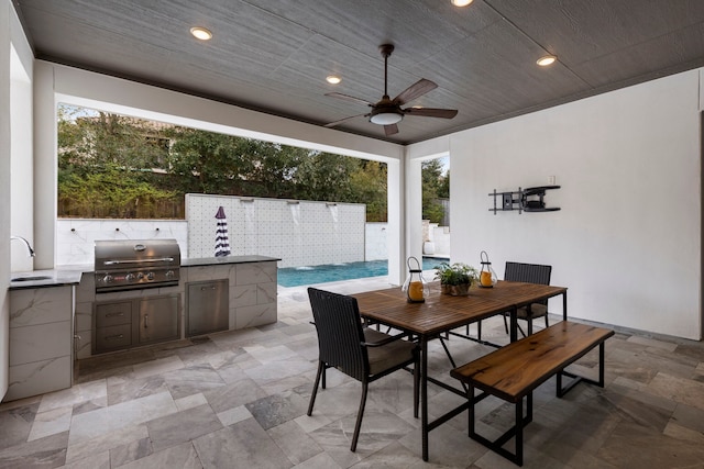 74 N Curly Willow Cir, Tomball, TX 77375 - view of patio / terrace with outdoor dining area, ceiling fan, and a sink