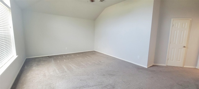 4315 Aspen Ct, Missouri City, TX 77459 - empty room featuring carpet floors, lofted ceiling, baseboards, and a ceiling fan