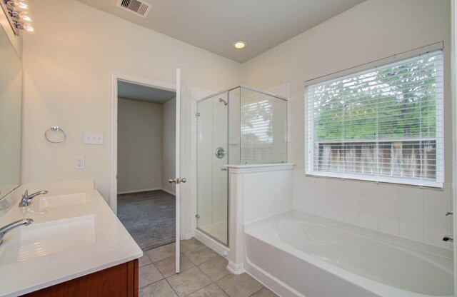 3102 Gianna Springs Ct, Humble, TX 77396 - full bathroom with a bath, tile patterned floors, a stall shower, and double vanity