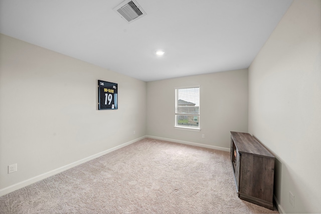 14122 Freeboard Dr, Santa Fe, TX 77510 - empty room featuring baseboards, light colored carpet, and recessed lighting
