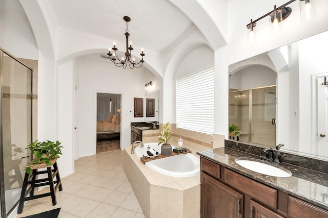 19910 Standing Cypress Dr, Spring, TX 77379 - ensuite bathroom featuring a shower stall, a bath, vanity, tile patterned floors, and crown molding