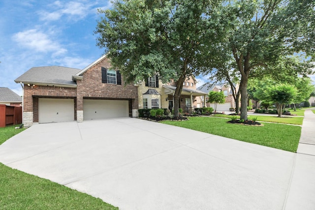 19910 Standing Cypress Dr, Spring, TX 77379 - traditional-style home with a front lawn, brick siding, driveway, and an attached garage