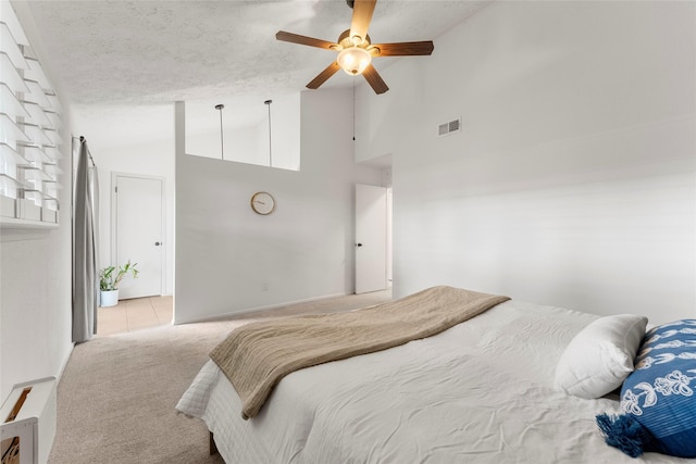 3531 Acorn Springs Ln, Spring, TX 77389 - carpeted bedroom with a textured ceiling, a ceiling fan, and high vaulted ceiling