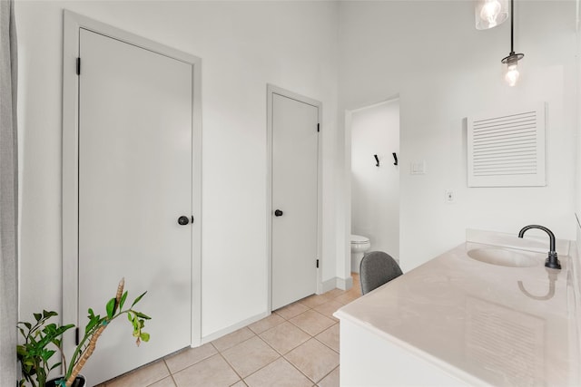 3531 Acorn Springs Ln, Spring, TX 77389 - bathroom featuring tile patterned floors, vanity, and toilet