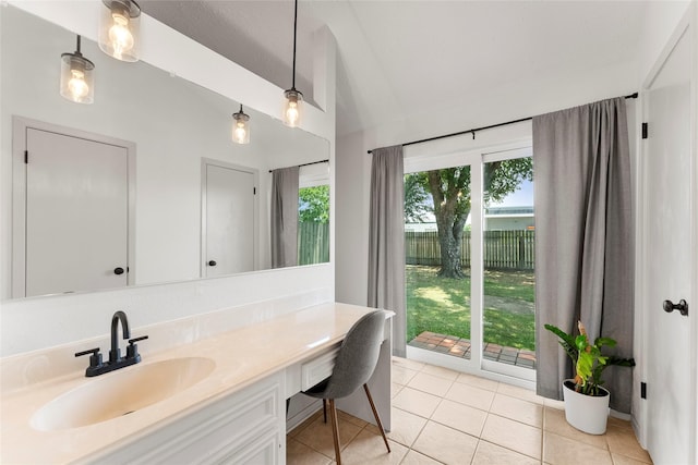 3531 Acorn Springs Ln, Spring, TX 77389 - bathroom featuring vaulted ceiling, vanity, and tile patterned flooring