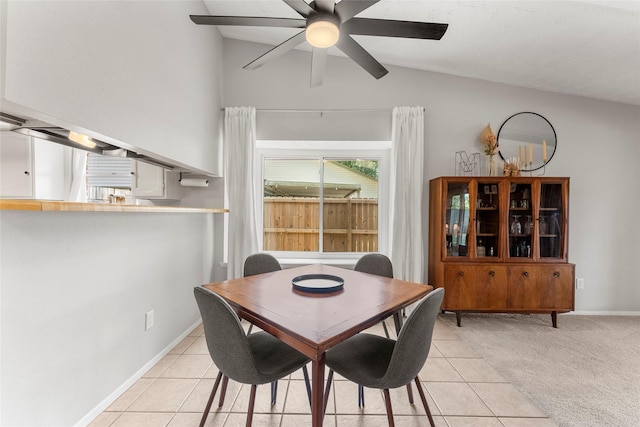 3531 Acorn Springs Ln, Spring, TX 77389 - dining room featuring vaulted ceiling, light tile patterned floors, ceiling fan, and baseboards