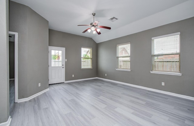 15303 Arnold, Baytown, TX 77523 - spare room featuring a ceiling fan, light wood-type flooring, baseboards, and lofted ceiling