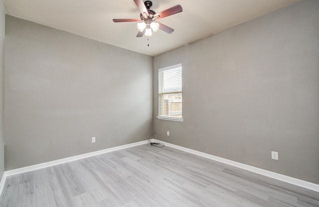 15303 Arnold, Baytown, TX 77523 - unfurnished room featuring wood finished floors, ceiling fan, and baseboards