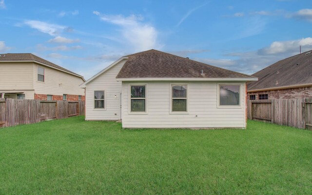 15303 Arnold, Baytown, TX 77523 - rear view of property featuring a shingled roof