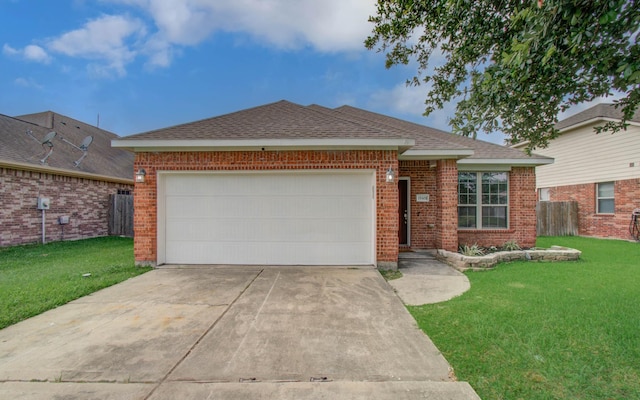 15303 Arnold, Baytown, TX 77523 - view of front of house featuring concrete driveway, an attached garage, brick siding, and a shingled roof