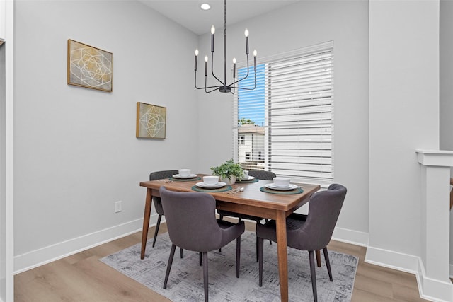 1616 Euel St, Houston, TX 77009 - dining space with a chandelier, light wood-type flooring, baseboards, and recessed lighting