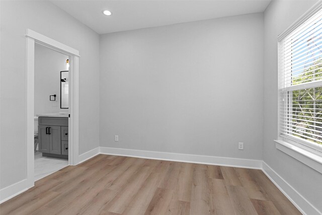 1616 Euel St, Houston, TX 77009 - empty room featuring light wood-style flooring, baseboards, and recessed lighting