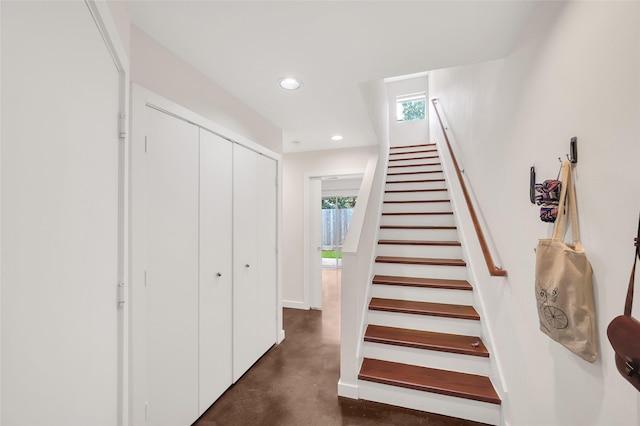 668 Lester St, Houston, TX 77007 - stairway with concrete flooring, recessed lighting, and baseboards
