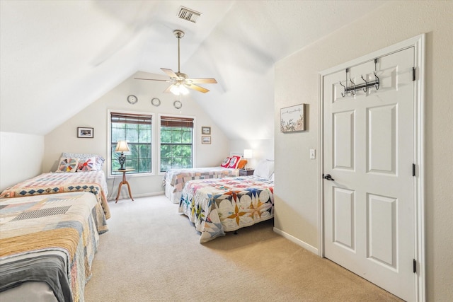 210 Queen Rd, Clear Lake Shores, TX 77565 - carpeted bedroom featuring lofted ceiling and a ceiling fan