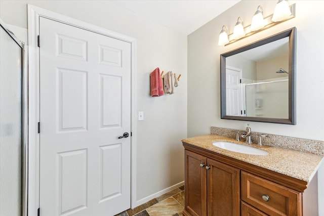 210 Queen Rd, Clear Lake Shores, TX 77565 - full bath with vanity, an enclosed shower, and baseboards
