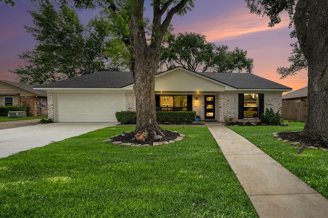2907 Cypress Point Dr, Missouri City, TX 77459 - view of front of property featuring brick siding, an attached garage, concrete driveway, a yard, and a porch