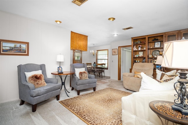 111 Ann St, Crockett, TX 75835 - living room featuring light carpet and a chandelier