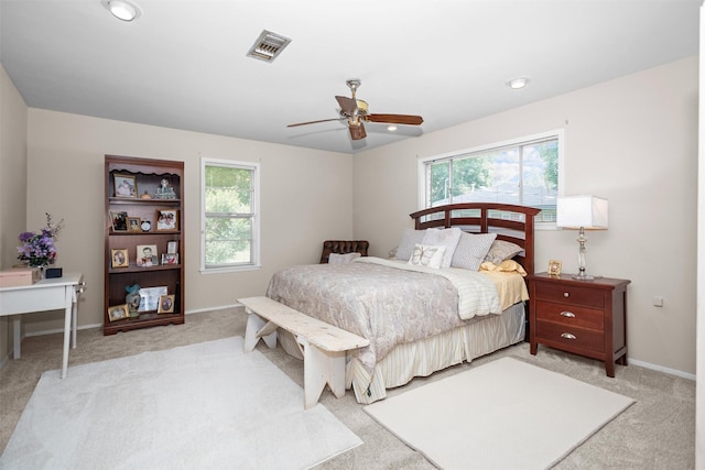 111 Ann St, Crockett, TX 75835 - bedroom featuring light carpet, baseboards, a ceiling fan, and recessed lighting