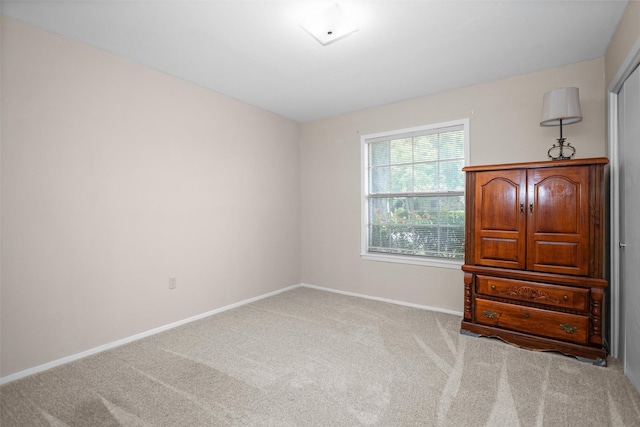 111 Ann St, Crockett, TX 75835 - unfurnished bedroom featuring carpet floors and baseboards