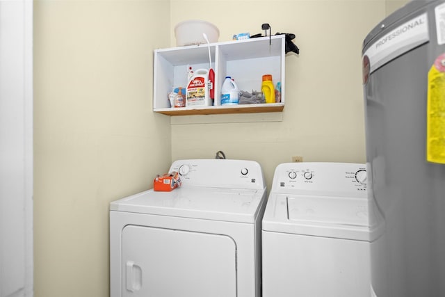 111 Ann St, Crockett, TX 75835 - laundry area with washer and dryer and water heater