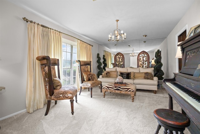 111 Ann St, Crockett, TX 75835 - living room with carpet, a chandelier, and baseboards