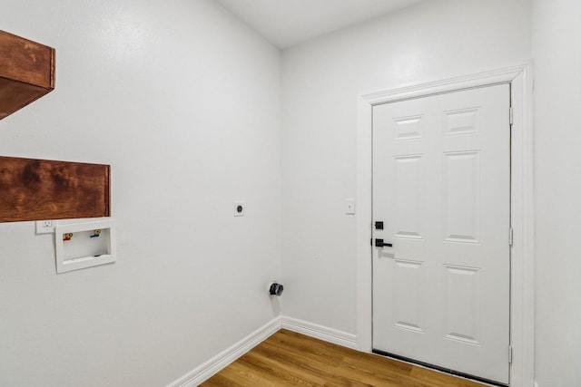 16731 Water Oak Dr, Channelview, TX 77530 - laundry room featuring hookup for a washing machine, light wood finished floors, electric dryer hookup, and baseboards