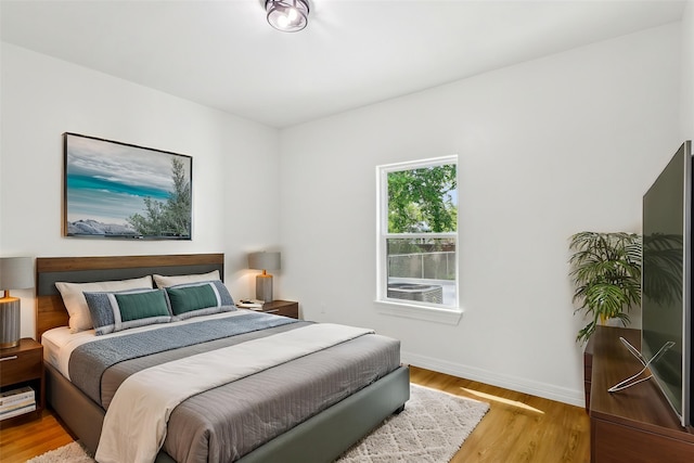 16731 Water Oak Dr, Channelview, TX 77530 - bedroom with light wood-style floors and baseboards