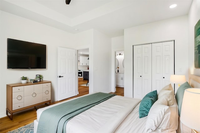 16731 Water Oak Dr, Channelview, TX 77530 - bedroom featuring wood finished floors, a closet, recessed lighting, and ceiling fan